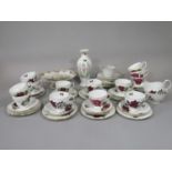 A collection of Colclough and Hanleigh ware tea wares, both with similar red and white rose