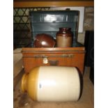 A small Victorian domed top tin trunk with brass fittings and simulated wood grain finish together