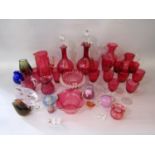 Collection of cranberry glass to include goblets, jugs, decanters etc, with further modern art glass
