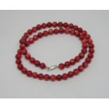 Coral bead necklace with silver clasp