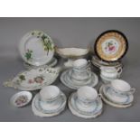 A collection of 19th century ceramics, all with floral decoration, comprising an oval two handled