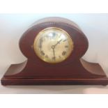 An unusual American two train chiming mantle clock by William L Gilbert, the engraved silvered