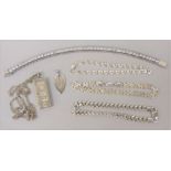 Group of silver jewellery comprising a substantial tennis bracelet set with princess cut paste,