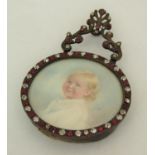 CCM (Early 20th century British school) - bust length miniature portrait of a blue eyed, fair haired