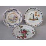 A collection of three late 18th/19th century continental tin glazed earthenware plates, including an