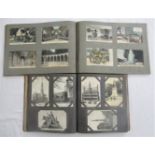 Four albums containing a large quantity of mixed topographical postcards both colour and black and