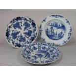 A collection of three 19th century continental tin glazed earthen ware chargers with blue and