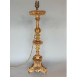 Antique gilt wood and gesso table lamp, converted to electricity, 51cm high
