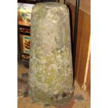 A weathered natural stone staddle stone base of cylindrical inverted tapered form 60 cm high