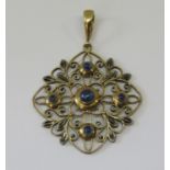 Arts & Crafts style 9ct openwork pendant of quatrefoil form, set with five cabochon blue stones, 3.