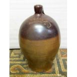 A 19th century salt glazed stoneware flagon with impressed merchants mark for G Bragg, Birmingham,