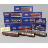 8 boxed Bachmann coaches including 4 Pullman and 2 Post Office vans together with boxed van, a plank
