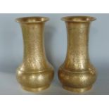 A pair of eastern gilt bronze flared neck vases, 17cm high