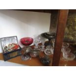 A mixed lot of various glassware to include champagnes, candlesticks, etc, together with a small