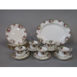A collection of Royal Albert Celebration pattern wares comprising an oval meat plate, five cups, six