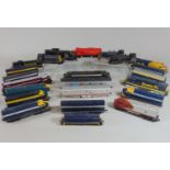 Box of mixed HO locomotives, unboxed, some repainted together with a Walthers diesel locomotive 4616