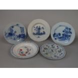 A collection of five late 18th and 19th century tin glazed earthenware plates, including an