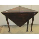 A Georgian style corner single drop-leaf pad foot occasional table, with triangular leaves and shell