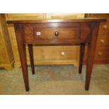 A good quality reproduction oak side table, the rectangular top with cleated ends over a frieze