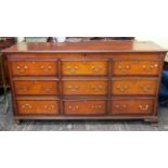 A Georgian oak north country coffer or mule chest with rising lid, the front arrangement enclosed by