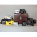 Good quality cased Ricoh camera with various lens together with a collection of other cameras