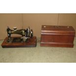 A vintage Frister and Rossmann walnut cased portable sewing machine together with a small wicker