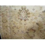 A good quality Kashmir carpet with Zeigler design, gold ground, 330 x 230cm