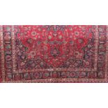 Good large Persian Mashad country house type full pile carpet, with scrolled blue decoration upon
