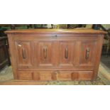 An 18th century pine mule chest, the rising lid over a front elevation of four rectangular panels