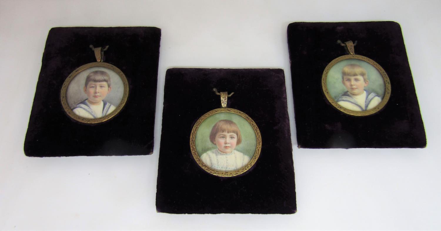 B George early 20th century British school - A set of three bust length miniature portraits of