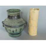 A Chinese archaic looking bronzed twin handle twin handle baluster vase, with geometric relief