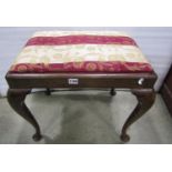 A Georgian style dressing stool of rectangular form with drop-in upholstered seat, raised on