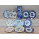 A collection of oriental ceramics including a cylindrical vase with all over blue and white