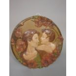 An early 20th century Austrian relief moulded plaque of circular form by Ernst Wahliss, showing a