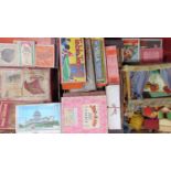 Large collection of vintage toys and games including a wooden framed puppet theatre with dancing