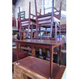 A Richard Hornby Afromosia pull-out extending dining table, the top with moulded outline and