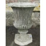 A well weathered Georgian style composition fluted urn with square cut base (AF) incomplete, 50 cm