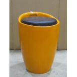 A retro style orange coloured moulded plastic/fibreglass stool of cylindrical tapered form with