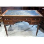 An inlaid Edwardian mahogany writing table with crossbanded detail and box wood stringing, worn