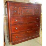 A Victorian mahogany bedroom chest fitted with an arrangement of six oak lined drawers with turned