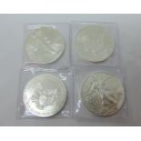 Four x 2011 US 1oz silver US Eagle coins