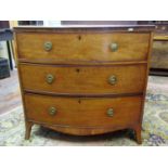 A regency mahogany bow fronted chest of three long drawers, raised on swept supports, 92cm wide