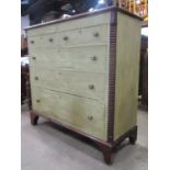 A 19th century oak bedroom chest of two short over three long graduated drawers flanked by split