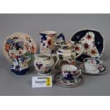 A quantity of 19th century and later Gaudy type wares including jugs, plates, cups and saucers, etc,