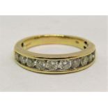 14ct ten stone channel set diamond ring, size R/S, 4g (some stones loose)
