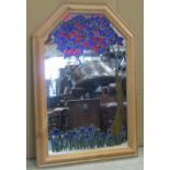 A contemporary wall mirror with moulded pine arched frame and applied leaded glass tree and floral