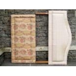 Two upholstered bed head boards of varying design with floral printed gingham type fabric