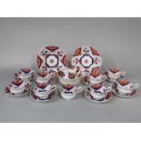 A collection of 19th century Gaudy tea wares comprising milk jug, slop bowl, pair of cake plates,
