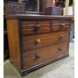 An Edwardian mahogany dressing chest of two long and two short drawers beneath further trinket