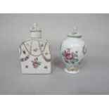 An 18th century Chinese tea caddy and stopper of two sided arched topped form with famille rose